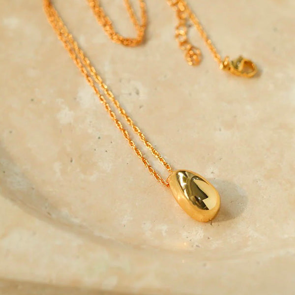 Golden Egg Necklace in 14k Gold Over Sterling Silver